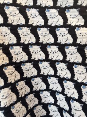 Quilted sweater with White Kitten Pattern and Blue Accents Paul and Joe Sister